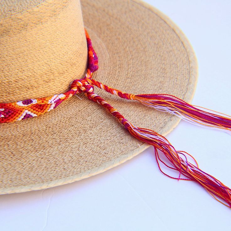 These Beautiful hat bands are carefully hand woven by Rosa in Chiapas,Mexico. Each band showcases a unique and colorful patterned design using traditional macrame techniques. Add a touch of handmade artistry to your hat collection today! Width 1” Length: 23 inches, not including fringe Fringe 9” each side , for an adjustable fit. Fits most hats Polyester yarn All items are shipped from US. All Mi Mundo Mexicano items are 100% handmade by artisans in Mexico. Each stitch and item is completely uni Adjustable Curved Brim Handwoven Panama Hat, Handmade Southwestern Multicolor Hats, Handmade Multicolor Southwestern Hats, Handwoven Adjustable Curved Brim Panama Hat, Handwoven Adjustable Hat With Curved Brim, Adjustable Handwoven Hats With Curved Brim, Adjustable Curved Brim Handwoven Hat, Adjustable Handwoven Hat With Curved Brim, Adjustable Handwoven Toquilla Straw Hat