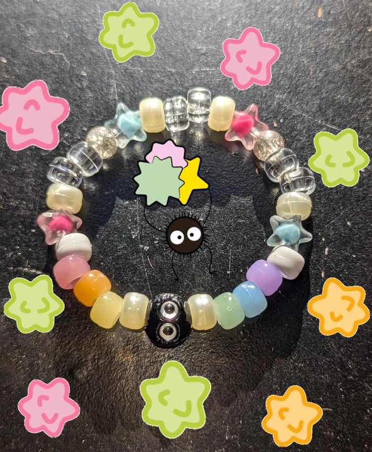 ✩ Studio Ghibli / Spirited Away inspired bracelet ✩ These cute little soot sprite bracelets change color in the sun though the power of uv sensitive beads  ✩ Kandi singles / beaded bracelets ✩ All orders come with extra goodies ^^ Rainbow Beaded Bracelets For Rave Gift, Rainbow Beaded Bracelets For Gifts, Rave Style, Handmade Multicolor Rave Friendship Bracelets, Rainbow Colored Rave Style Beaded Bracelets For Gifts, Handmade Rave Stretch Bracelet As Gift, Handmade Black Beaded Bracelets For Rave, Handmade Stretch Bracelet For Rave Gift, Handmade Stretch Bracelet For Gift, Rainbow Rave Bracelets For Friendship