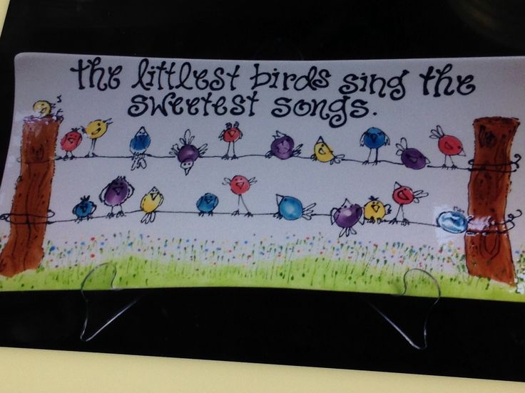 a sign that says the littlest birds sing the sweetest songs on it's side