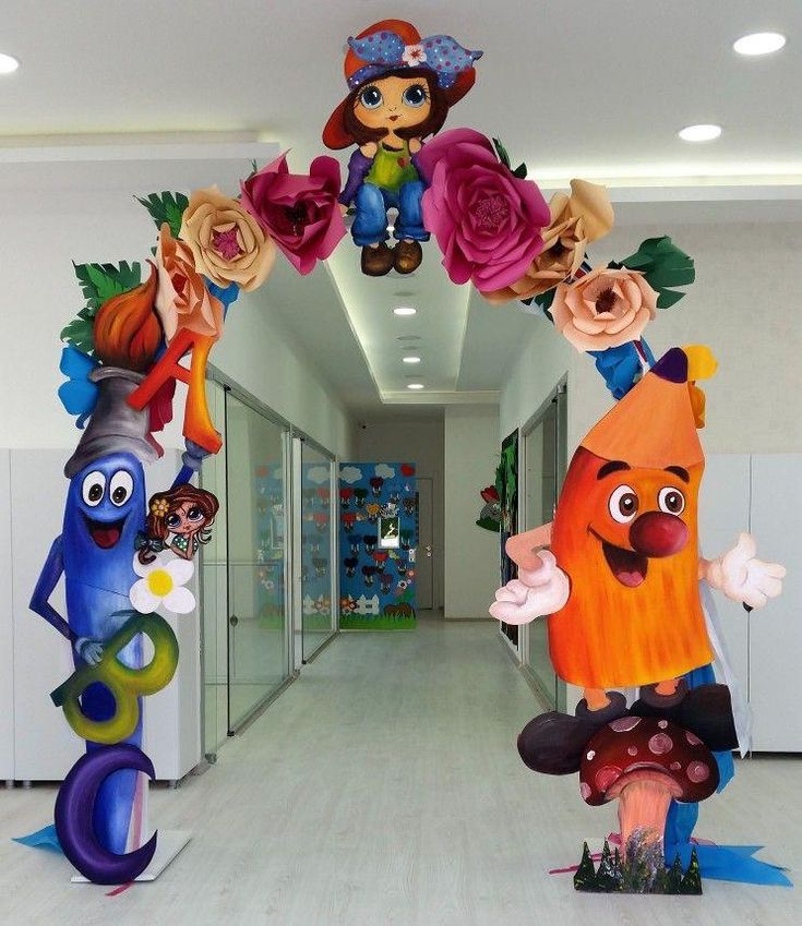 the entrance to an office building decorated with cartoon characters