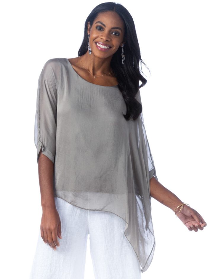 The Martina blouse features elegant silk layers and an asymmetrical hemline, perfectly suited with jeans or pants for an effortless, feminine look. Classic fit—one size fits most Boat neck, three-quarter length sleeves with banded cuffs, asymmetrical silk overlay 100% silk, viscose lining Hand wash, lay flat or hang to dry Made in Italy Suit With Jeans, Silk Overlay, Feminine Look, Silk Top, Boat Neck, Every Woman, Summer Sale, Three Quarter, Lay Flat