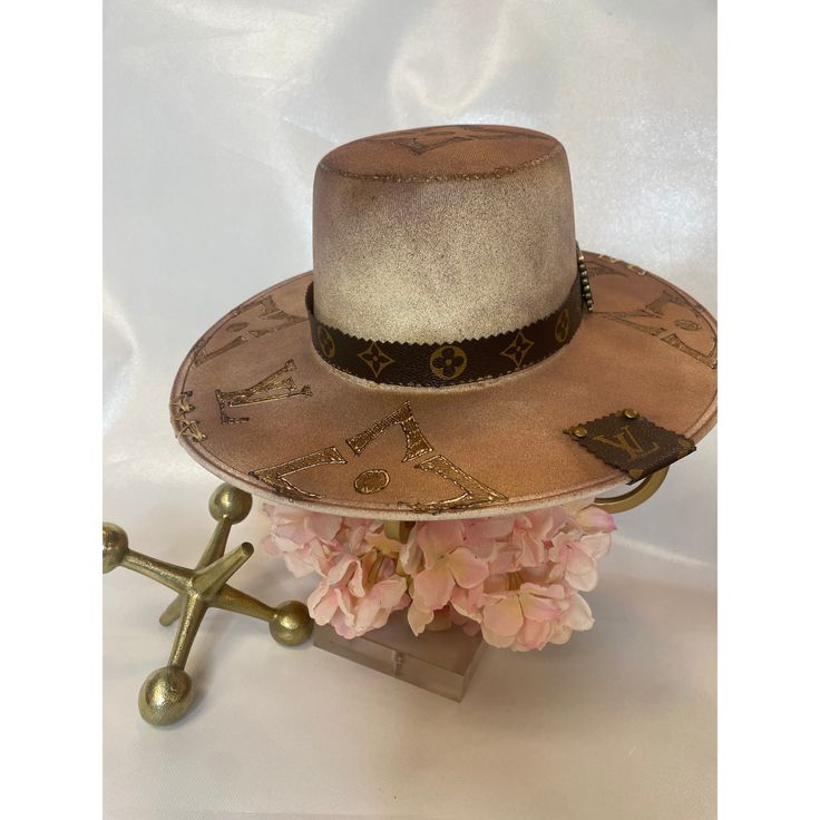 Custom and One of a Kind these hats are an unbelieveable accessory to add to any outfit. Upcycled Louis Vuitton, Taupe Flats, Louis Vuitton Hat, Upcycle Ideas, Head Pieces, Western Hats, Turbans, Flats Top, Custom Hats