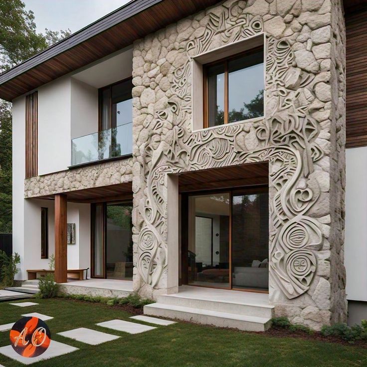 a house that is made out of stone and has an orange fire hydrant in front of it