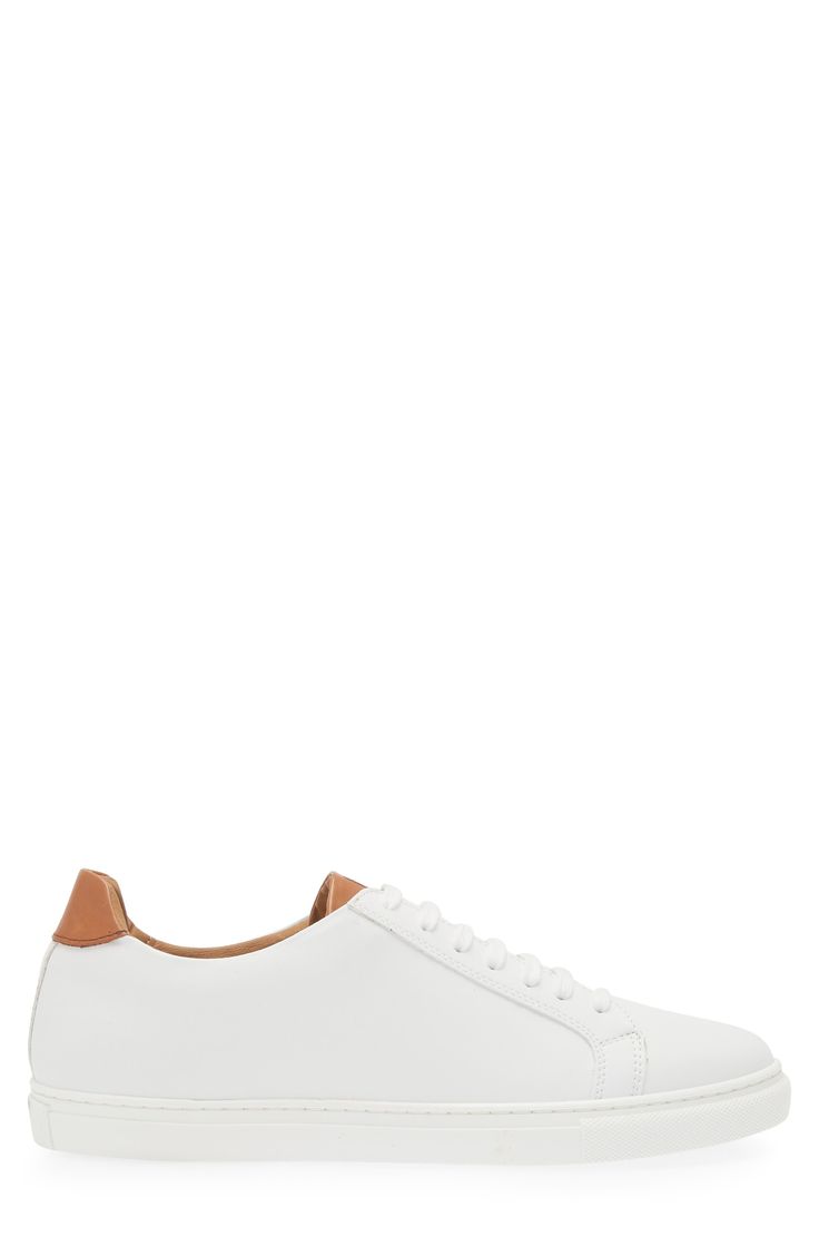 A crisp leather upper refines this dapper lace-up sneaker resting on a springy rubber cupsole for a seamless fusion of luxury and comfort. Leather upper/synthetic lining/rubber sole
 Made in Italy Classic High-top Sneakers With White Sole And Laces, Modern Custom Sneakers With Rubber Sole For Spring, Classic High-top Sneakers With Laces, Classic Lace-up Platform Sneakers With Contrast Sole, Classic White Leather Platform Sneakers, Classic High-top Synthetic Sneakers With Laces, Classic Low-top Sneakers With Contrast Sole, Modern High-top Sneakers With Textured Sole For Spring, Modern Custom Sneakers With Contrast Sole For Spring