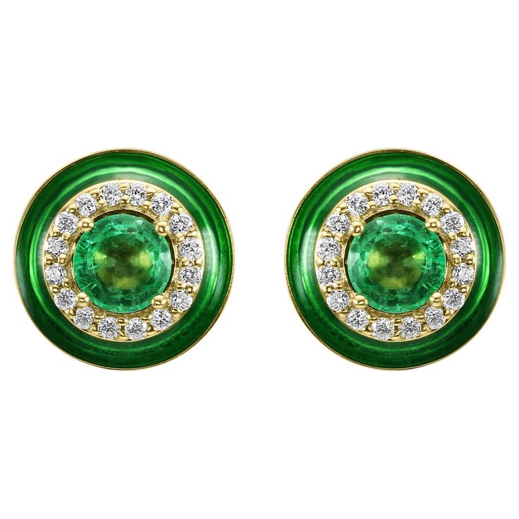 These earrings features a mesmerizing Emerald round center, delicately set and weighing a total of 0.32 carats. The rich green hue of the emerald adds a touch of luxury and timelessness to the design, making it a standout piece in your collection. Surrounding the emerald is a double halo of White Diamond Rounds, totaling to 0.200 carats & Green Enamel. These diamonds are meticulously set to enhance the brilliance of the center stone and add a dazzling sparkle to the earrings. The double halo design creates depth and dimension, enhancing the beauty of the Emerald and creating a mesmerizing contrast against the 18K Yellow Gold setting. Crafted with precision and artistry, these stud earrings also feature Green Enamel detailing, adding a pop of color and a touch of modern flair to the design. Halo Design, American Modern, Double Halo, Rich Green, Yellow Gold Setting, Green Enamel, Gold Fashion, Touch Of Modern, White Diamond