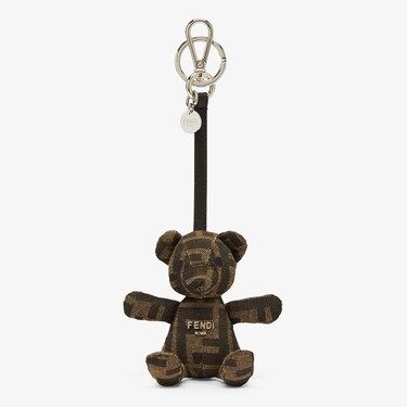 Teddy bear-shaped key ring. Snap clip and logo ring. Made of brown FF jacquard and embellished with brown leather details. Fendi Roma lettering and palladium-finish metalware. Made in Italy. One Size Ring Snap, Fragrance Gift, Clutch Pouch, Snap Clips, Boot Accessories, Women Essentials, Key Ring, Key Rings, Bags Women