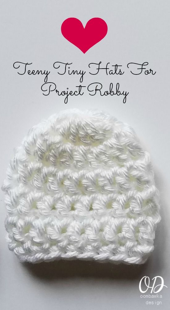 a white crocheted hat with the words jenny tiny tails for project baby written on it