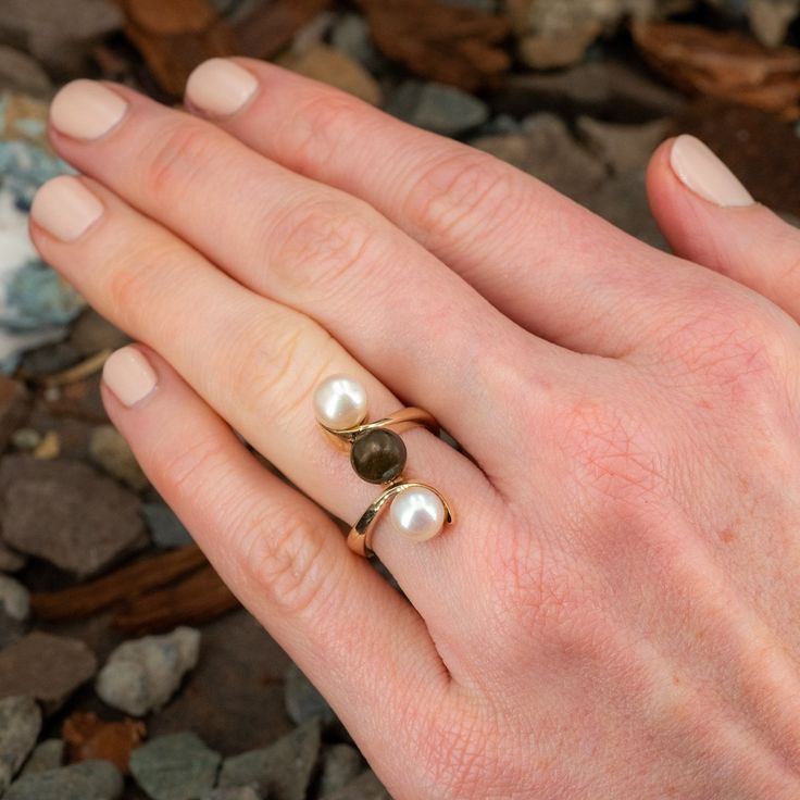 This wonderful three pearl ring is crafted of 14k yellow gold and features cultured saltwater pearls, one darker in color, and two light in color. The ring is currently a size 6.25. There is some very light epoxy visible around the base of the pearls. Three Pearl Ring, Trio Ring, Brand Presentation, Saltwater Pearls, Estate Rings, Old Boxes, December Birthstone, The Ring, Pearl Ring