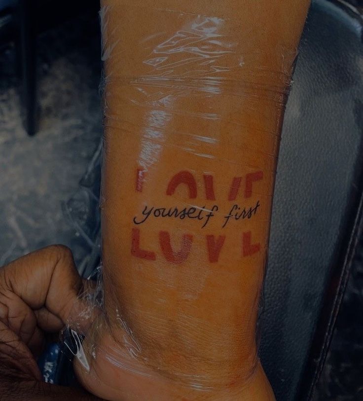 someone has written love on their arm and it says, i love you're first