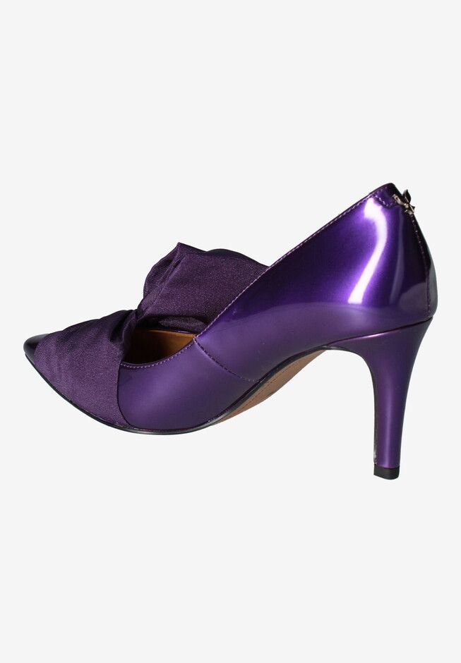 This slip on pump is made of satin or glitter fabrics with a synthetic lining and synthetic sole on a 3 inch stiletto heel. This style also features a Pointed Kitten Heels With Sculpted Heel For Parties, Evening Pointed Court Shoes With Padded Heel, Closed Toe Pump With 4-inch Heel For Party, Party Pumps With Sculpted Heel And Round Toe, Party Pumps With 4-inch Heel And Closed Toe, Party Pump With Sculpted Heel And Round Toe, Pointed Toe Pump With Sculpted Heel For Party, Party Pumps With 4-inch Heel And Pointed Toe, Elegant Slip-on Kitten Heels For Party