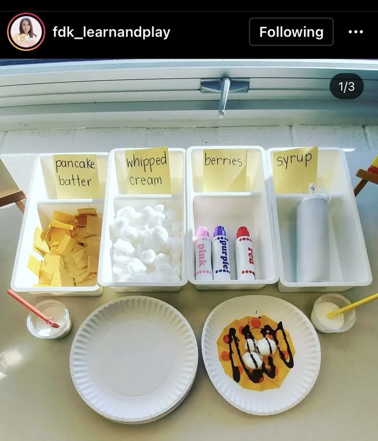 a table topped with plates and containers filled with food