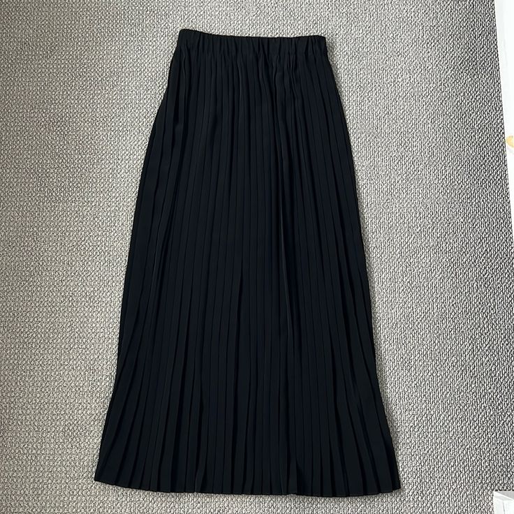 Size Xxs Petite, I Am 5’ 3 1/2” And This Hits Me At My Ankles, Black, 100% Polyester, Soft And Dressy, Pulls Up With An Elastic/Stretch Waist Black Maxi Skirt With Elastic Waistband For Work, Elegant Black Pleated Skirt With Elastic Waistband, Party Black Maxi Skirt With Elastic Waistband, Black Party Maxi Skirt With Elastic Waistband, Casual Black Pleated Skirt With Elastic Waistband, Black Long Pleated Skirt With Elastic Waistband, Black Pleated Maxi Skirt For Night Out, Casual Long Pleated Skirt For Night Out, Black Flowy Pleated Skirt With Elastic Waistband