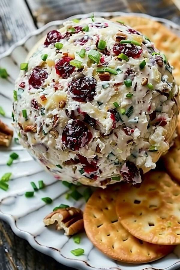 Valerie Bertinelli Recipes | Cranberry Pecan Cheese Ball 🧀���🌰 | Facebook Cream Cheese Cranberry Pecan Balls, Cheeseball For Thanksgiving, Pecan Cranberry Cheese Ball, Cranberry Pecan Cheeseball, Cranberry Cheese Ball Recipes, Fall Cheese Ball Recipes, Holiday Cheese Ball Recipes, Thanksgiving Cheese Ball Recipes, Cranberry Cheese Dip