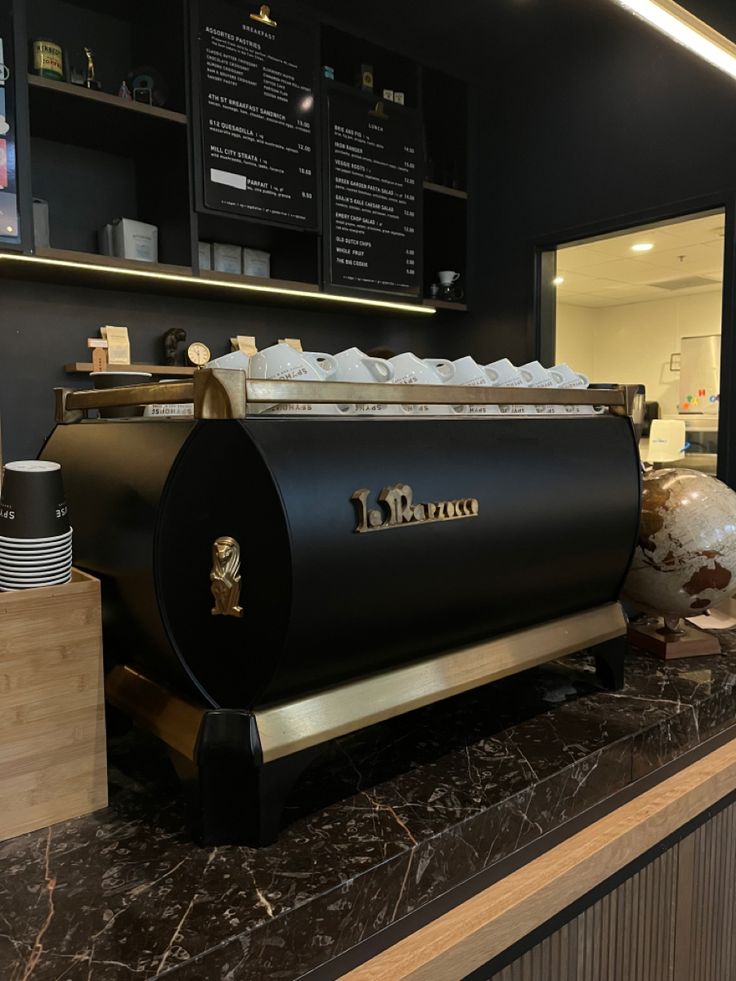 a coffee machine sitting on top of a counter