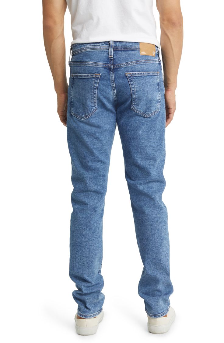 Made with a peck of stretch for comfort, these slim-fit jeans are the answer to casual days at the office and weekend-ready ensembles. 33 1/2" inseam; 14" leg opening; 10" front rise; 15" back rise (size 29) 98% cotton, 2% polyurethane Machine wash, tumble dry Imported Slim Fit Mid-rise Jeans For Business Casual, Business Casual Slim Fit Mid-rise Jeans, Mid-rise Slim Fit Jeans For Business Casual, Business Casual Mid-rise Slim Fit Jeans, Slim Fit Tapered Leg Jeans For Business Casual, Slim Fit Jeans With Tapered Leg For Business Casual, Fitted Jeans For Business Casual, Straight Fit Jeans For Business Casual, Medium Wash Straight Leg Business Casual Jeans