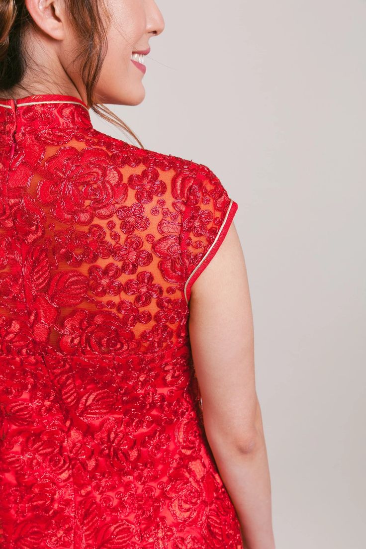 Have your tea ceremony in style with this beautiful lace red cheongsam. Designed to impress your parents and in-laws. Fitted Floral Embroidered Cheongsam For Party, Fitted Floral Embroidery Cheongsam For Party, Red Sleeveless Fitted Cheongsam, Red Fitted Sleeveless Cheongsam, Elegant Red Sleeveless Cheongsam, Elegant Sleeveless Red Cheongsam, Festive Sleeveless Lace Dress, Red Short Sleeve Cheongsam For Party, Fitted Sleeveless Ceremony Dress