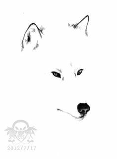 a black and white photo of a wolf's face with the words spirit on it