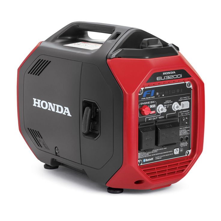 the honda generator is on display with its red and black cover over it's face