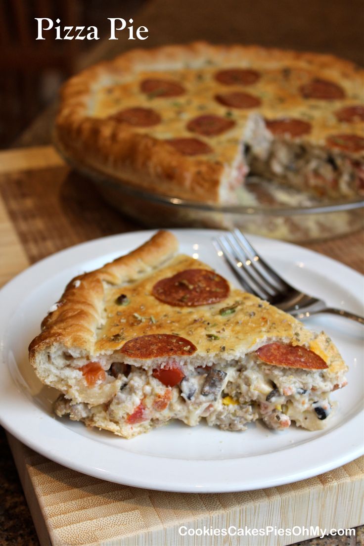 a piece of pizza pie on a plate with a fork and knife next to it