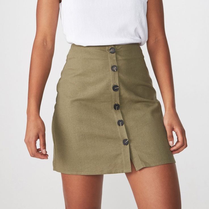 Cottonon Woven Medina Mini Skirt. A Line Button Down Mini Skirt In Khaki. 60% Vicose, 30% Linen, 10% Cotton. Button-up Mini Skirt For Day Out, Summer Workwear Button-up Mini Skirt, Summer Button-up Mini Skirt, Spring Short Skirt With Buttons, Chic Button-up Mini Skirt For Day Out, Button-up Mini Skirt For Summer, Summer Button-up Skort, Casual Fitted Skirt With Side Buttons, Casual Skort With Button Closure For Work