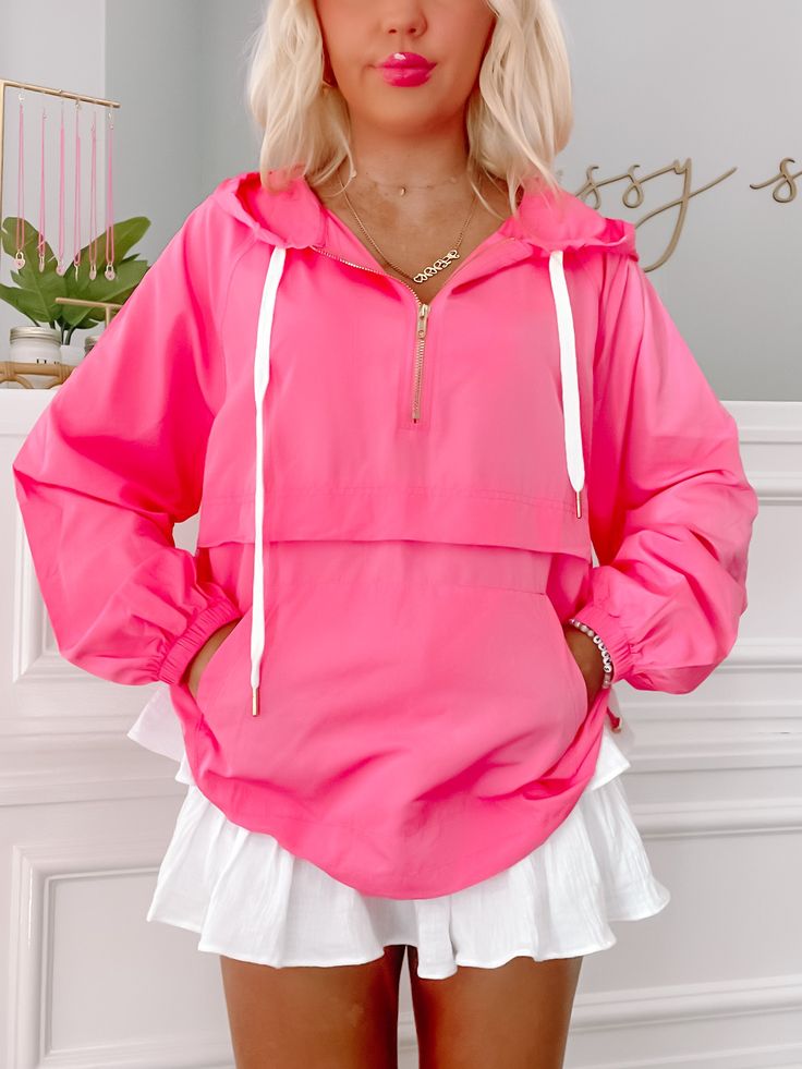 Our Pink Pacer Windbreaker Jacket is a zip up made of lightweight polyester. This pretty is water resistant with adjustable cord waistline and adjustable drawstring hoodie. content: 100% polyester care: hand wash cold model wearing small Pink Long Sleeve Nylon Hooded Jacket, Pink Nylon Hooded Jacket With Long Sleeves, Casual Hooded Windbreaker With Drawstring, Trendy Long Sleeve Nylon Windbreaker, Spring Outdoor Hoodie With Drawstring, Spring Outdoor Windbreaker With Drawstring, Casual Pink Half-zip Outerwear, Spring Athleisure Nylon Hooded Jacket, Casual Half-zip Windbreaker With Drawstring Hood