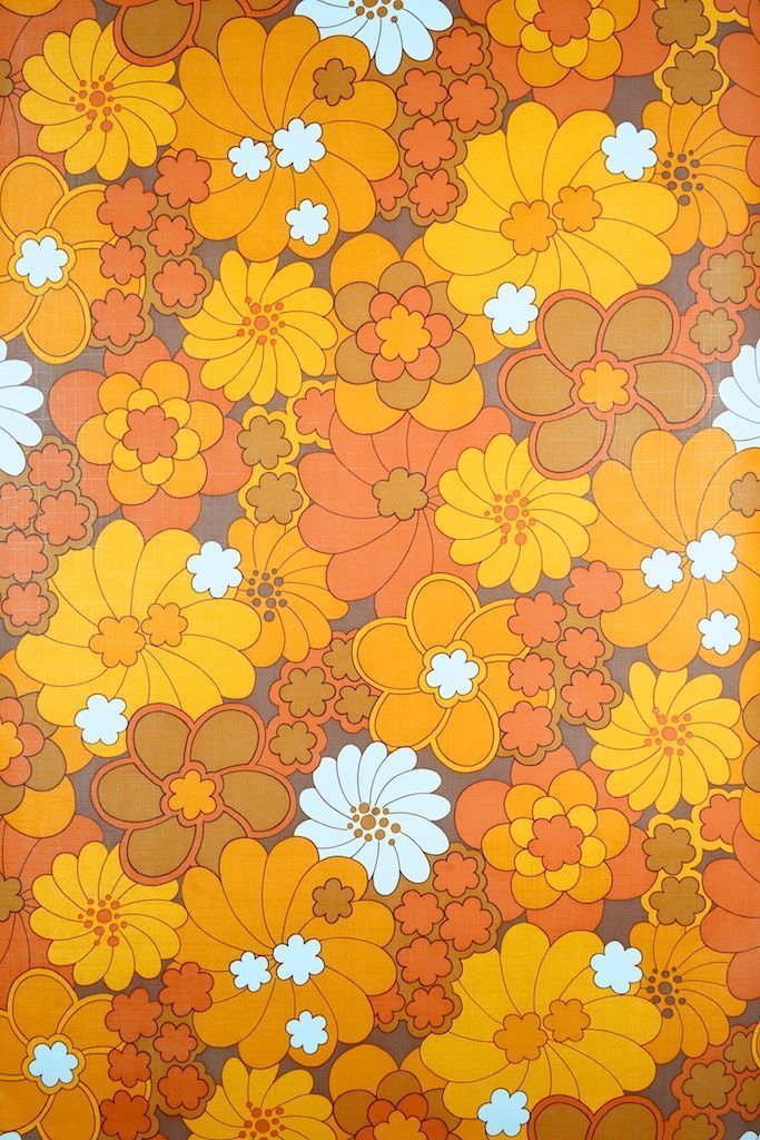 an orange and yellow flowered wallpaper with white flowers on the bottom right corner