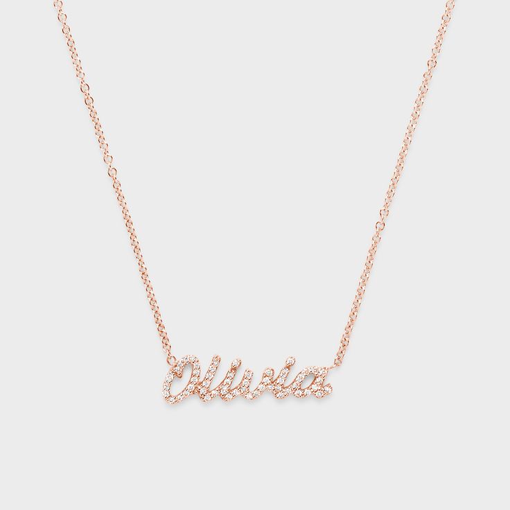 This customizable piece adds sparkle to any collection! 14k Rose Gold Diamond Necklace With Adjustable Chain, Personalized Rose Gold Elegant Necklace, Elegant Personalized Rose Gold Necklace, Personalized Elegant Sterling Silver Diamond Necklace, Elegant Personalized Sterling Silver Diamond Necklace, Classic Personalized Cubic Zirconia Necklaces, Classic Personalized Cubic Zirconia Necklace, Elegant Gold Name Necklace With Diamond Accents, Custom Rose Gold 14k Gold Pendant Necklace