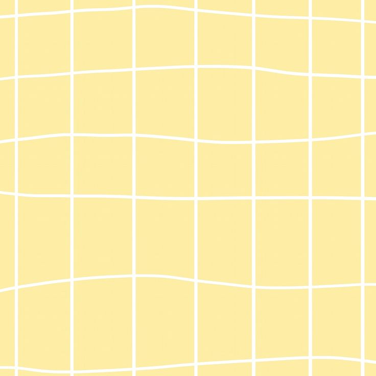 a yellow tiled wall with white lines on it