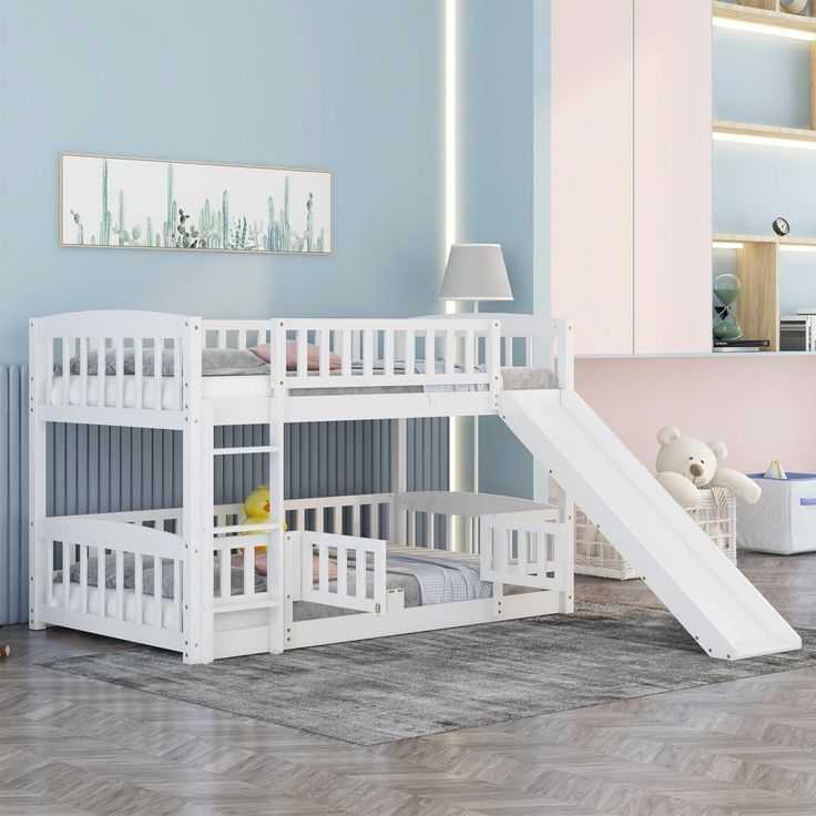 a child's bedroom with a slide and bunk bed