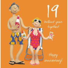 an image of two people on the beach with drinks and wine in their hands, happy anniversary card