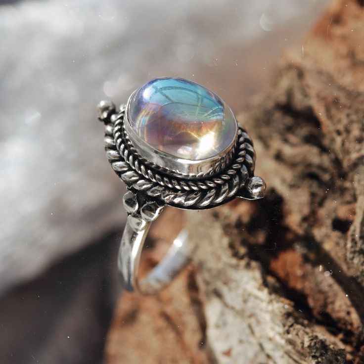 Stand out from the crowd with our boho chic iridescent mystic opal sterling silver ring. Our Little Luna is a beautiful ring with delicate detailing featuring an enchanting witchy mystic stone centre. A Shop Dixi classic to enhance your bohemian jewellery collection. MaterialSterling SilverSynthetic Mystic Opal SizingRing Front - Height 18mm Pumpkin Ring, Gothic Hippie, J 1, Gothic Ring, Bohemian Jewellery, Gothic Rings, Jewelry Website, Hippie Jewelry, Boho Ring