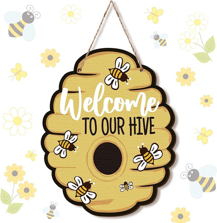 a wooden sign that says welcome to our hive