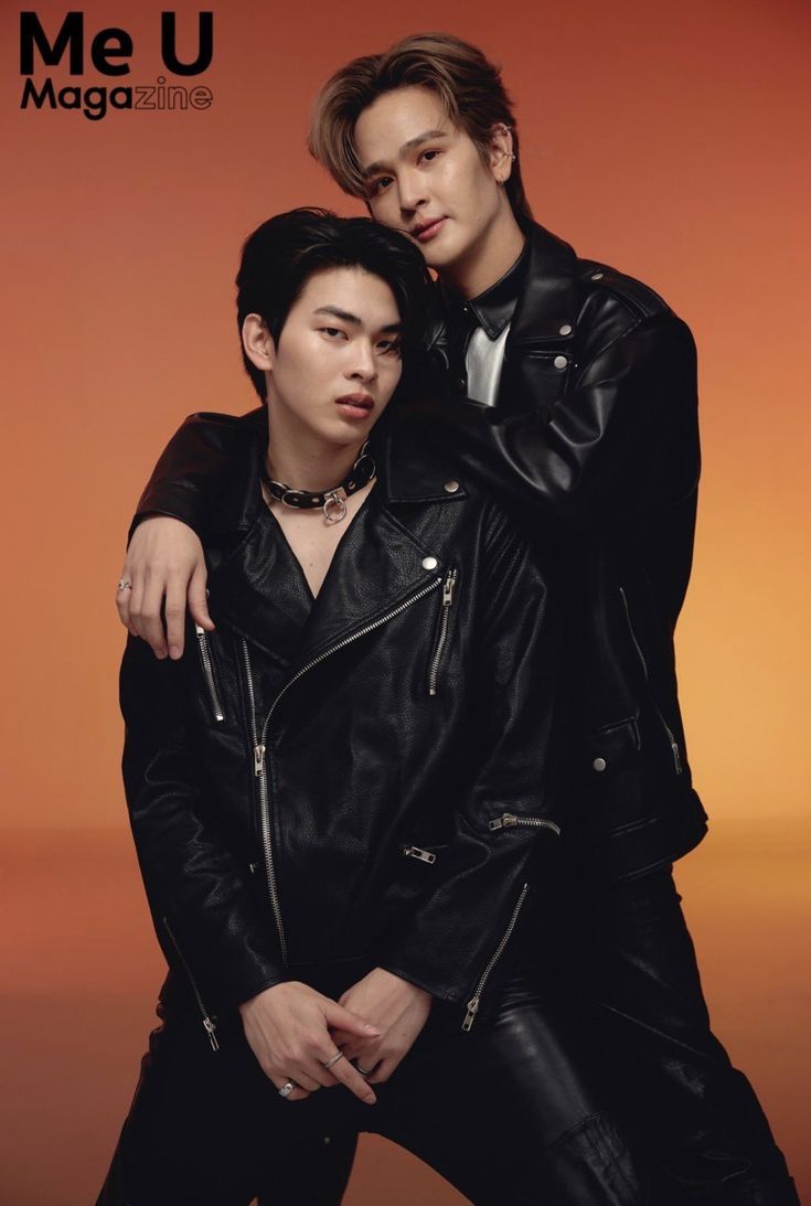 two men in black leather jackets posing for a magazine cover with their arms around each other