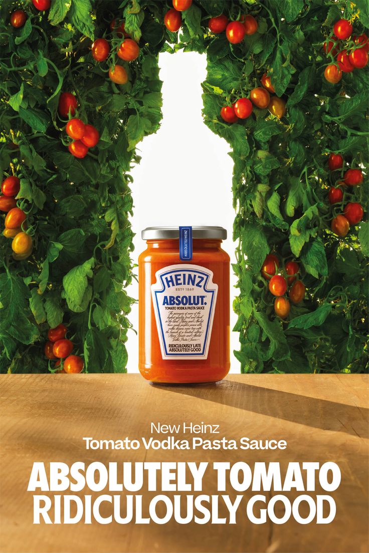 a jar of tomato sauce sitting on top of a wooden table