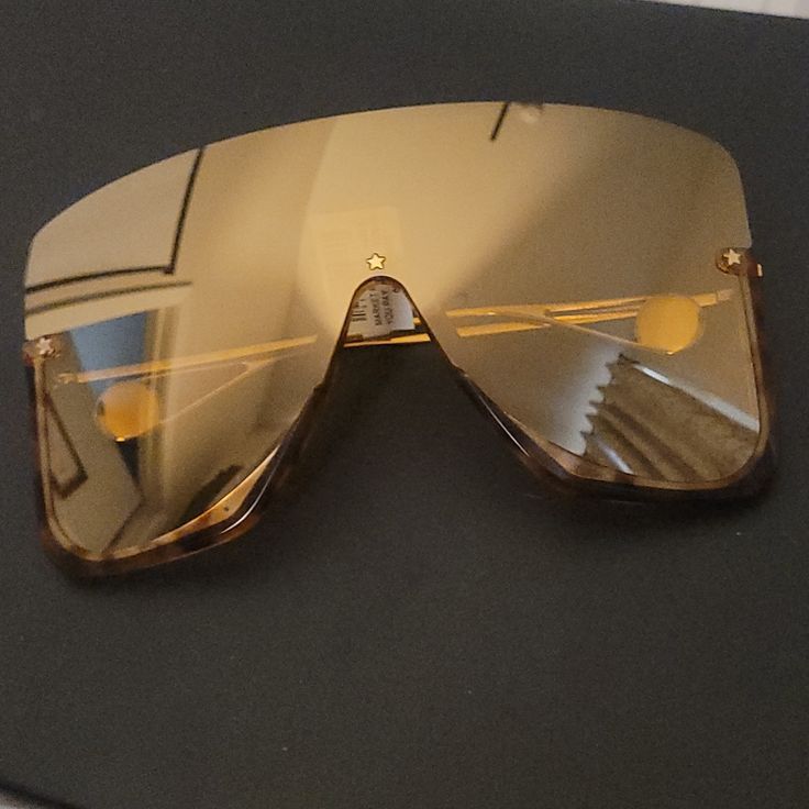 Brand New With Box Designer Gucci Shield Sunglasses With Mirrored Lenses, Gucci Gold Sunglasses With Gradient Lenses, Luxury Rectangular Shield Sunglasses With Mirrored Lenses, Elegant Gold Shield Sunglasses With Uv Protection, Gucci Gold Tinted Sunglasses, Gucci Gold Sunglasses With Uv Protection, Gold Rimless Shield Sunglasses With Polarized Lenses, Designer Gold Shield Sunglasses With Gradient Lenses, Modern Gold Shield Sunglasses With Glass Lenses