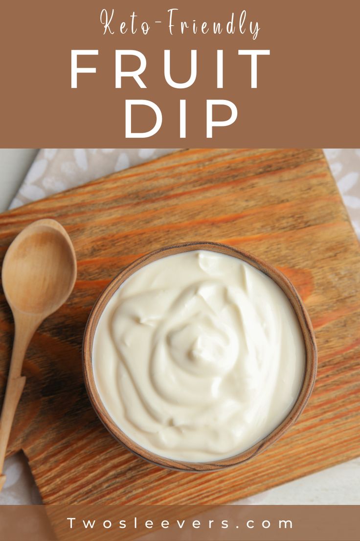 a bowl of yogurt on a wooden cutting board with the words keto - friendly fruit dip