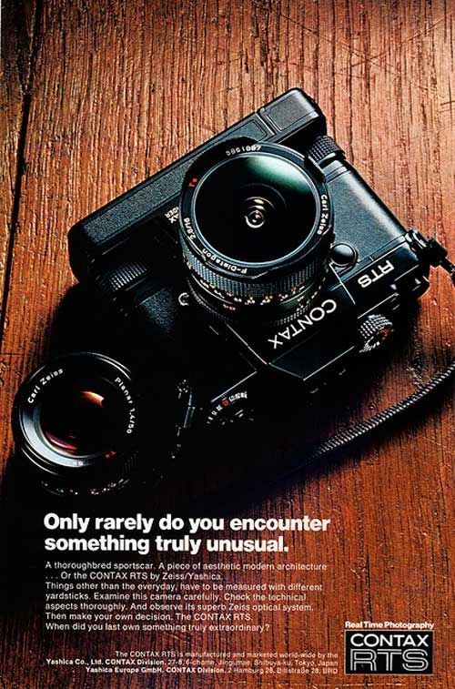 an old camera sitting on top of a wooden table with the caption only really do you encounter something truly unusual