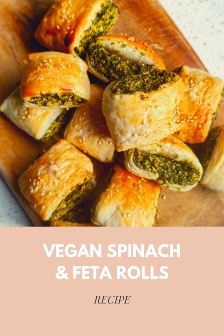 vegan spinach and feta rolls recipe on a cutting board with text overlay