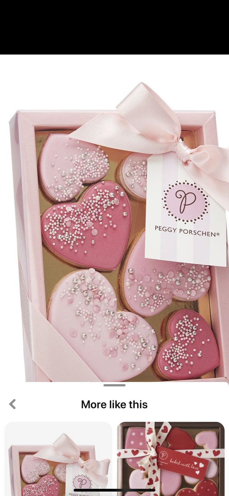 pink heart shaped cookies in a gift box