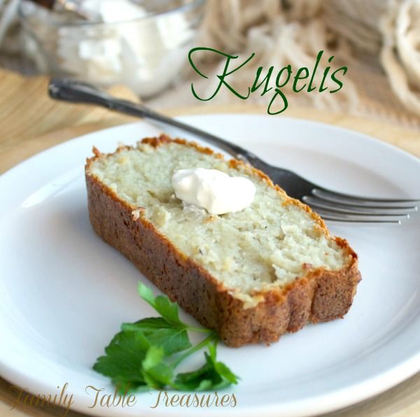 a piece of bread on a white plate with a fork and some sour cream in the middle