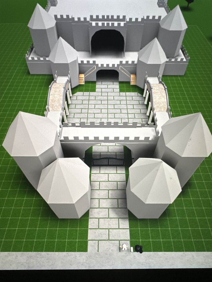 an architectural model of a castle with its courtyard