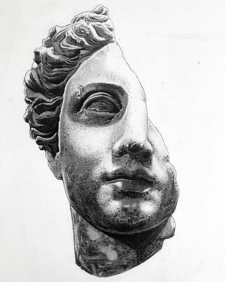 a black and white drawing of a statue head