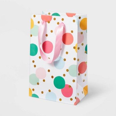 a paper bag with polka dots on it