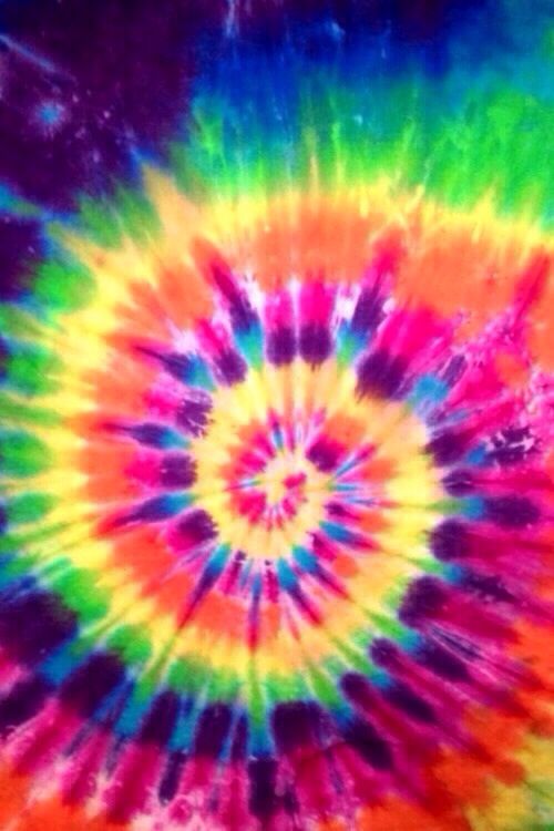 a colorful tie - dyed background with lots of colors