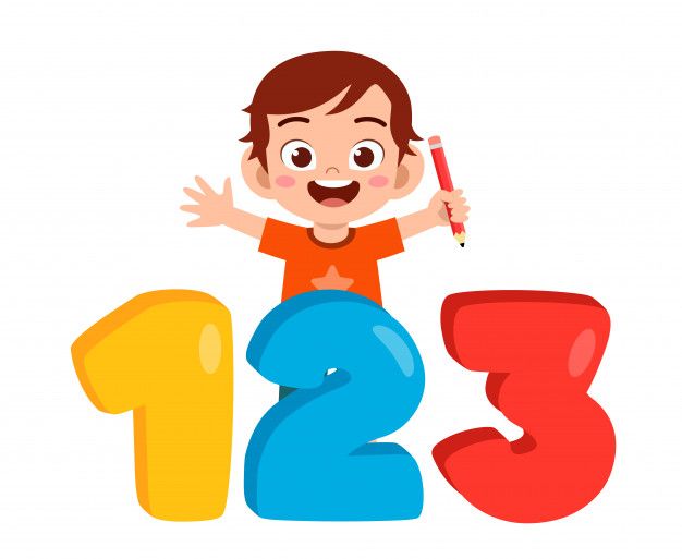 a little boy holding a pen and standing next to the numbers