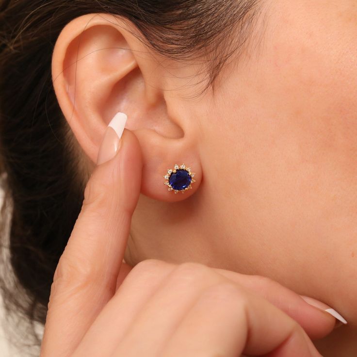 Sapphire; It symbolizes Loyalty, Love and Longing. It gives a positive vitality with the wonderful energy of its color.  Our 14K solid gold round sapphire earring surrounded by diamonds is suitable for daily use with its special design and is a stylish jewelery that you can use on your special days and gift it to your loved ones. A stylish jewel for you and your loved ones. Time to pamper yourself and your loved ones... Sapphire is the birthstone for those born in September. 🤍🤍 Special gifts f Elegant Diamond White Earrings With Birthstone, Elegant Diamond White Birthstone Earrings, Elegant Yellow Gold Jewelry With Lab-created Sapphire, Elegant White Gold Diamond Earrings With Birthstone, Elegant Jewelry With Lab-created Sapphire Round Stone, Elegant Lab-created Sapphire Jewelry With Round Stones, Elegant Jewelry With Lab-created Sapphire, Sapphire Birthstone Earrings, Elegant Formal Diamond Earrings With Birthstone