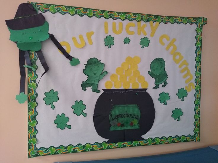 a st patrick's day banner with shamrocks and leprechaun hats