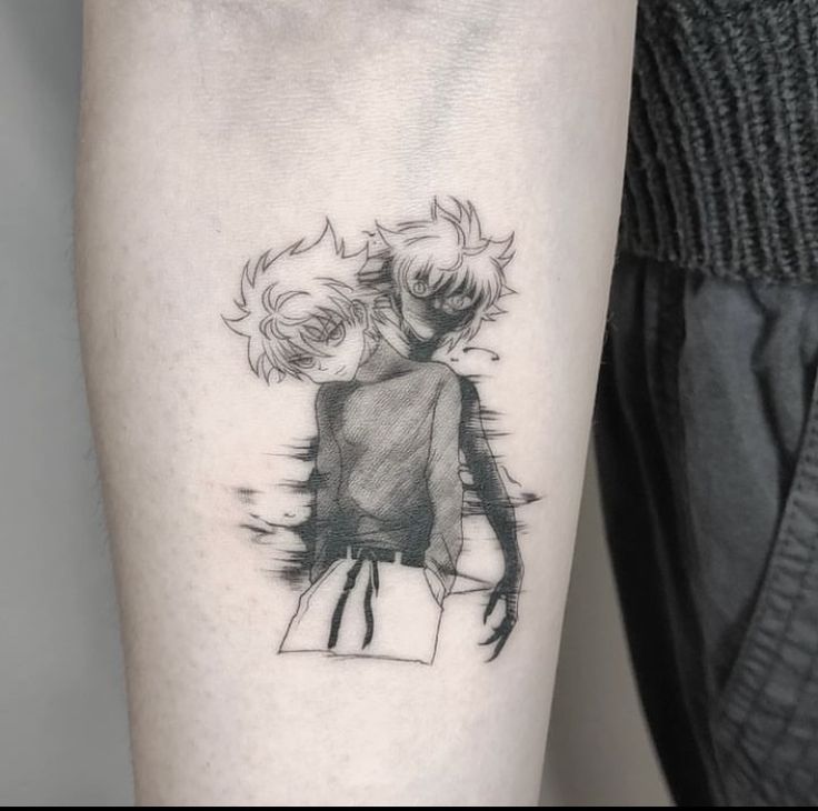 a person with a tattoo on their arm