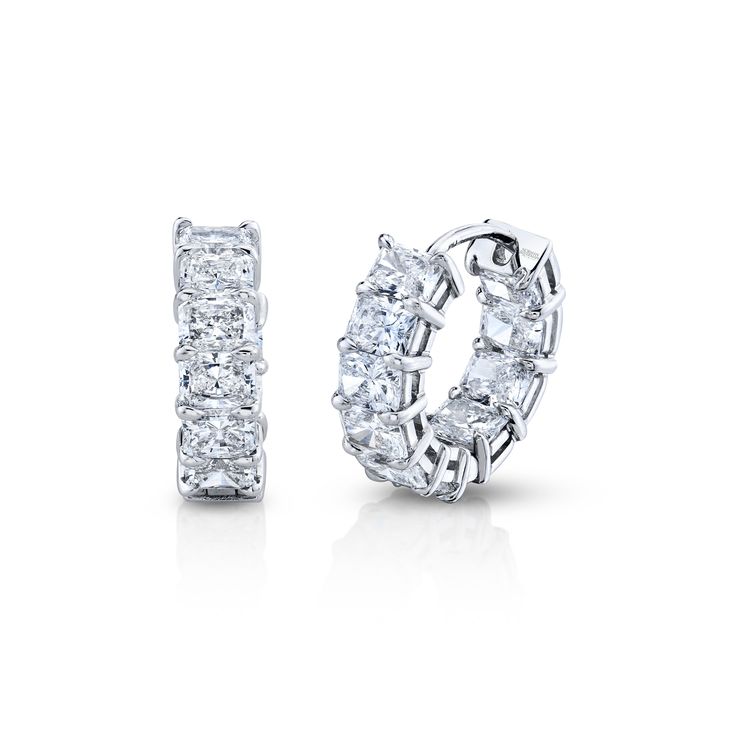 These stunning huggies are the perfect choice for a little luxurious sparkle. The average stone size is .19 carats for a total carat count of 4.16. These Radiant-Cut diamonds are precision cut by master jewelers to maximize brilliance, clarity and sparkle before being set in 18k white gold. Diamond White Baguette Cut Diamond Earrings, Baguette Cut Diamond Earrings With Accents, Luxury Baguette Cut Diamond Earrings, White Gold Diamond Baguette-cut Earrings, White Gold Diamond Accent Baguette Earrings, White Gold Baguette Cut Diamond Earrings With Accents, Platinum Diamond Earrings With Baguette Diamonds For Anniversary, Silver Diamond Earrings With Radiant Cut, Luxury Diamond White Diamond Huggie Earrings