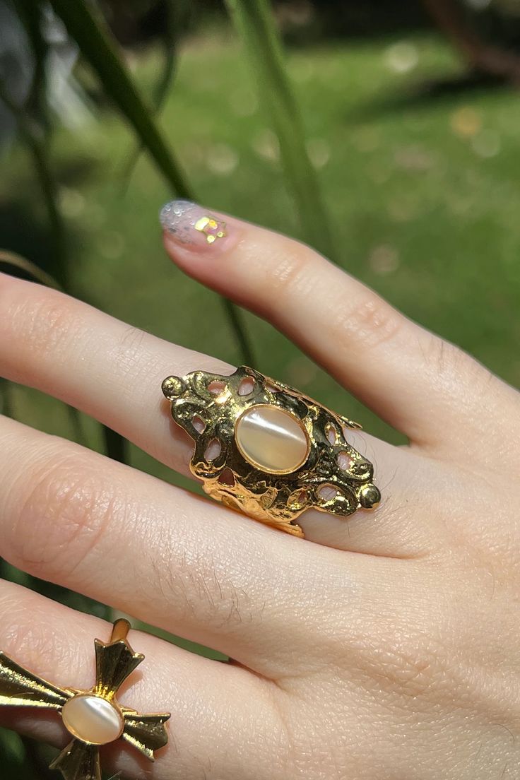 Armoured Midi Ring With Stone – Stonehart Jewelry Mystical Cabochon Rings As A Gift, Celestial Gold Crystal Ring With Birthstone, Gold Celestial Crystal Ring With Birthstone, Gold Moonstone Cabochon Open Ring, Gold Cabochon Moonstone Open Ring, Gold Open Moonstone Ring With Cabochon, Gold Open Ring Moonstone Cabochon, Gold Amethyst Ring With Large Stone As Gift, Gold Spiritual Moonstone Open Ring